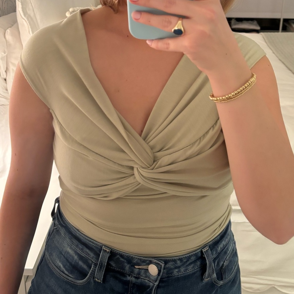 Reformation fun off the shoulder top in light green!